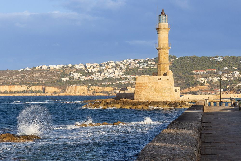 Greece, Crete, Chania harbor, old town. Chania Lighthouse. art print by Emily M. Wilson for $57.95 CAD