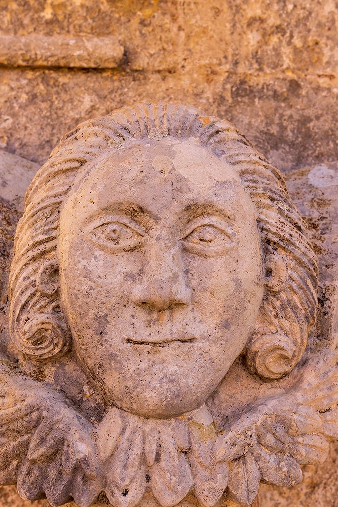 Greece, Crete, Akrotiri. Agia Triada (Holy Trinity) Monastery. Face carved in stone. art print by Emily M. Wilson for $57.95 CAD