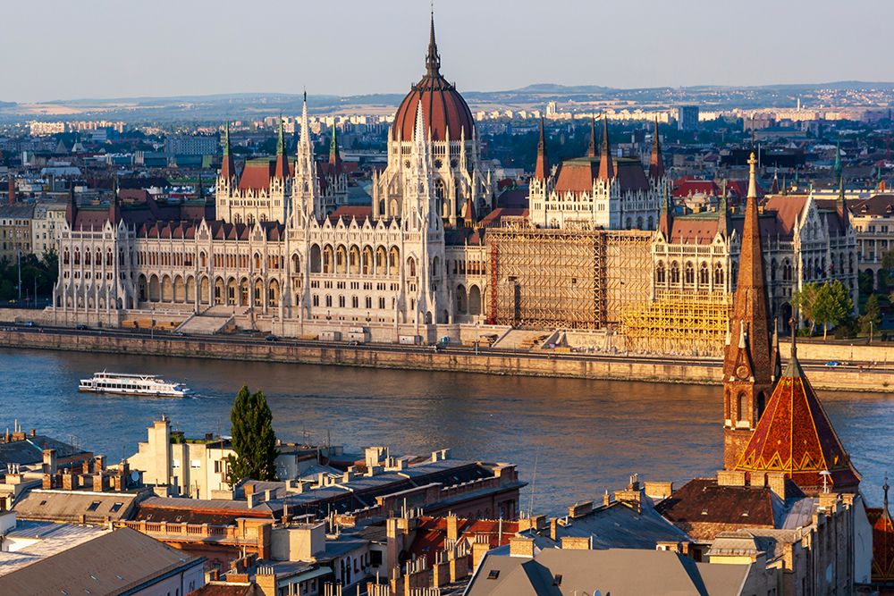 Tour boat passes Hungarys Parliament-built between 1884-1902 is the countrys largest building-It ha art print by Tom Haseltine for $57.95 CAD