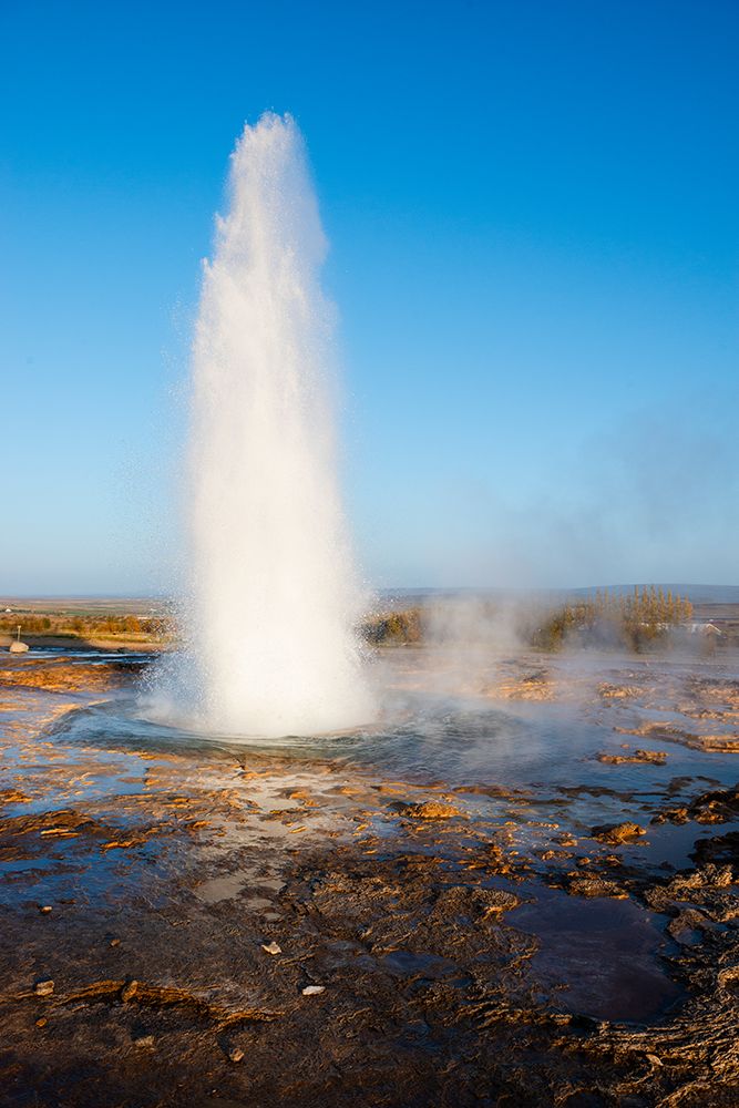 Haukadalur Valley, Iceland. Eruption of the Strokkur geyser at the Haukadalur valley in Iceland. art print by Alison Wright for $57.95 CAD