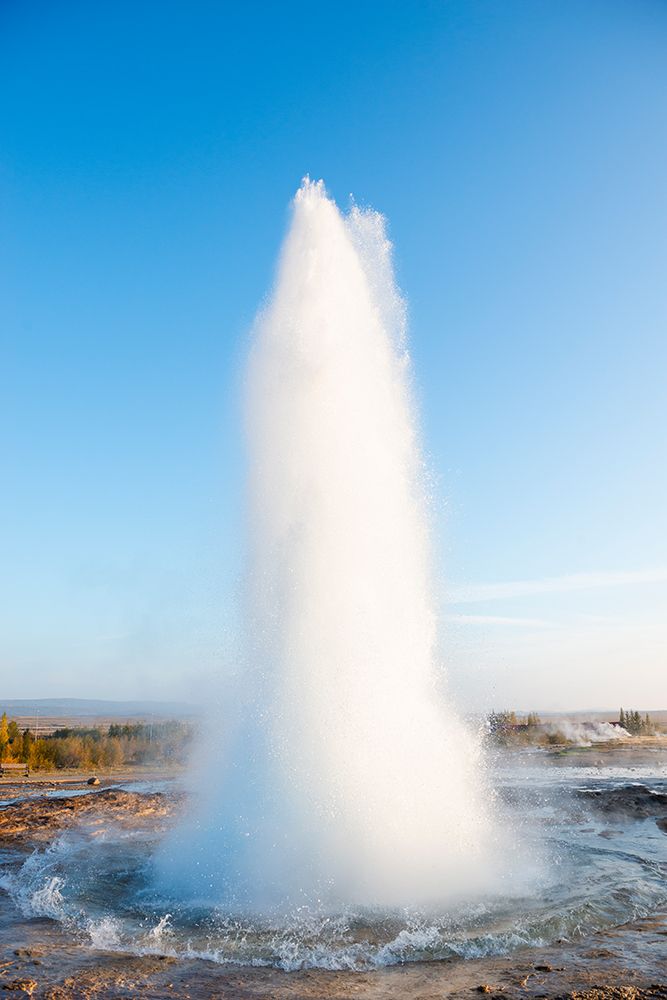 Haukadalur Valley, Iceland. Eruption of the Strokkur geyser at the Haukadalur valley in Iceland. art print by Alison Wright for $57.95 CAD