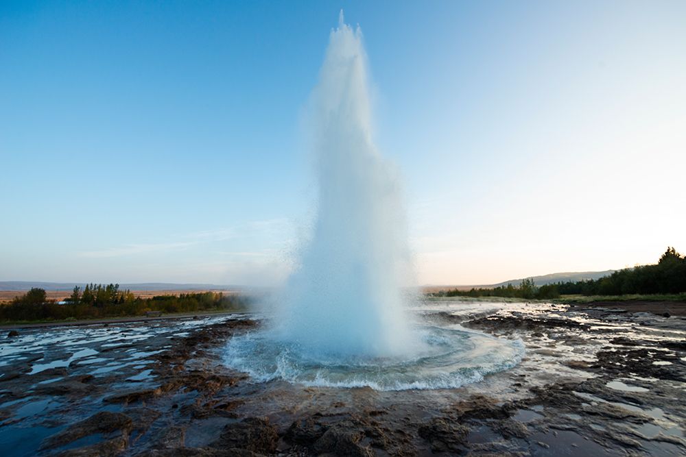 Haukadalur Valley, Iceland. Eruption of the Strokkur geyser at the Haukadalur valley in Iceland. art print by Alison Wright for $57.95 CAD