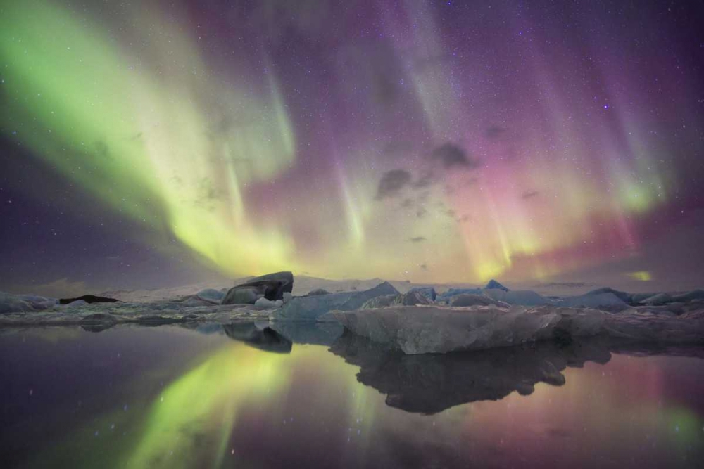 Iceland, Jokulsarlon Aurora lights over a lagoon art print by Josh Anon for $57.95 CAD