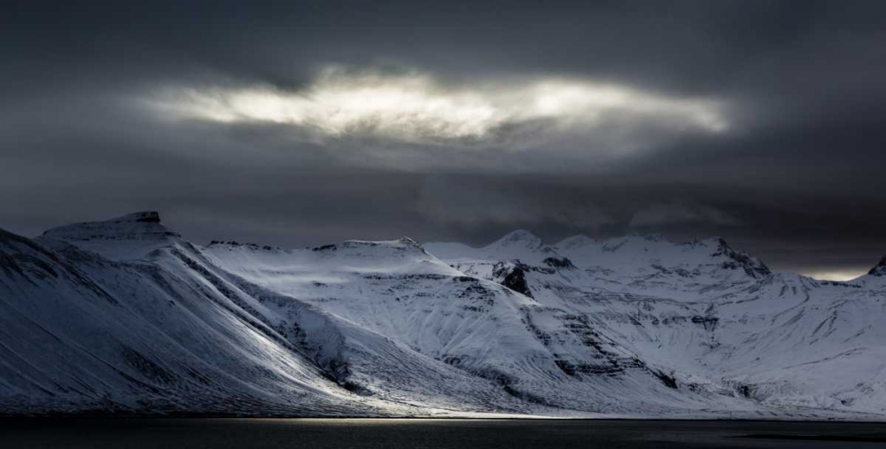 Iceland Sunlight bursts through storm clouds art print by Bill Young for $57.95 CAD