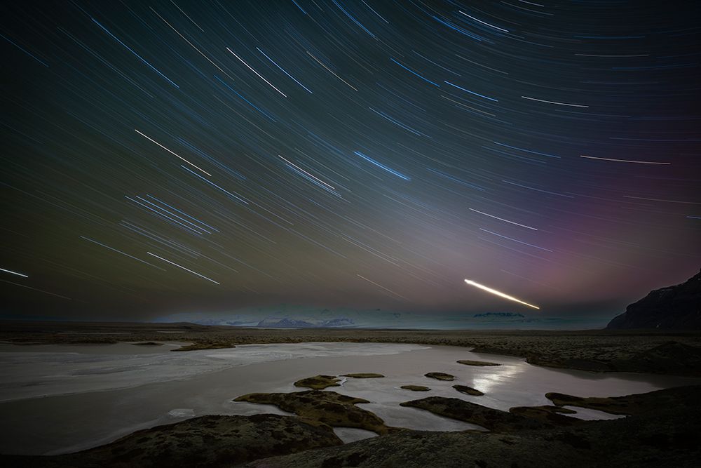 Iceland, star trails over Jokulsarlon Glacier Lagoon art print by Hollice Looney for $57.95 CAD