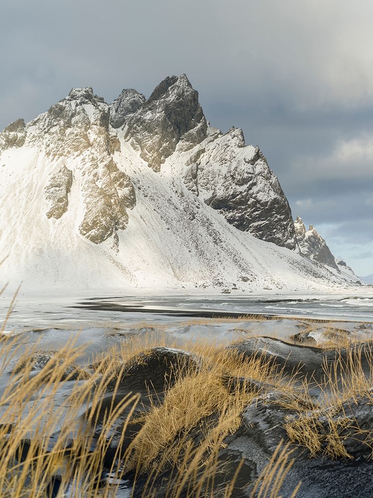 Coastal landscape with dunes at iconic Stokksnes during winter and stormy conditions Iceland art print by Martin Zwick for $57.95 CAD