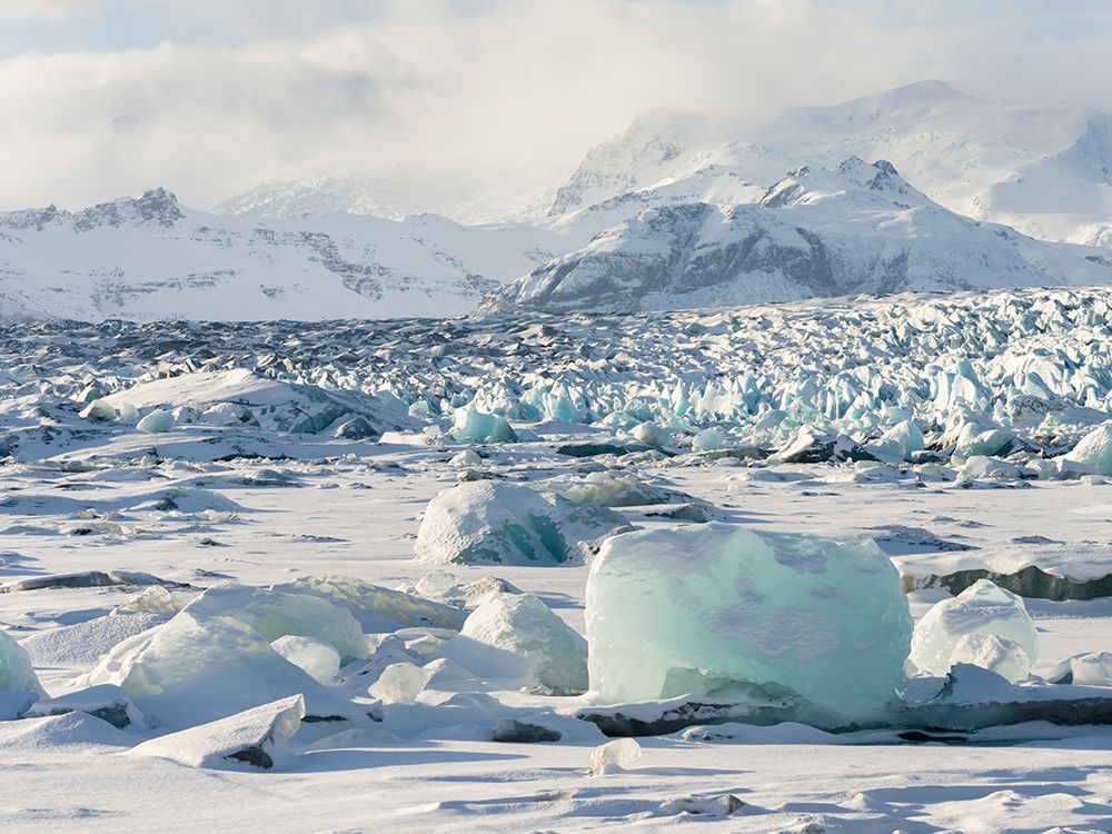 Northern shore of glacial lagoon Jokulsarlon with glacier Breidamerkurjokull art print by Martin Zwick for $57.95 CAD