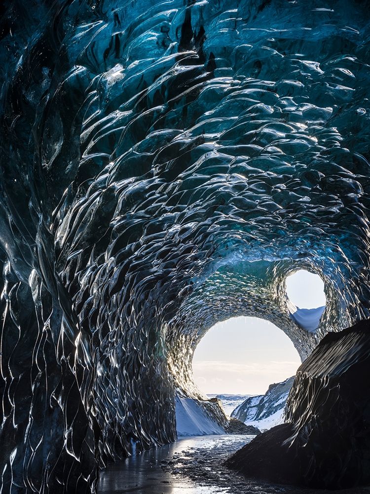 Ice cave at the northern shore of glacial lagoon Jokulsarlon in glacier Breidamerkurjokull art print by Martin Zwick for $57.95 CAD