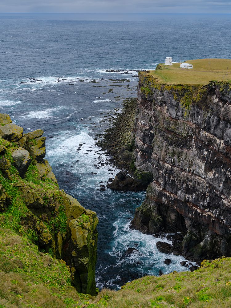 Iceland, cliffs of Latrabjarg and lighthouse Bjargtangar during autumn. art print by Martin Zwick for $57.95 CAD