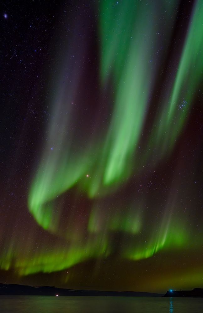Iceland. Northern Lights over fjord Isafjardardjup near Isafjordur view towards Hornstrandir. art print by Martin Zwick for $57.95 CAD