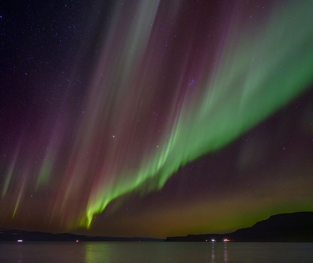 Iceland. Northern Lights over fjord Isafjardardjup near Isafjordur view towards Hornstrandir. art print by Martin Zwick for $57.95 CAD