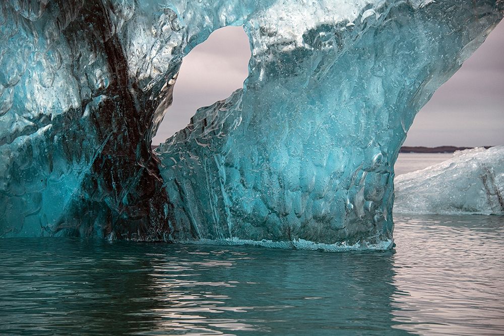 Icebergs from the Jokulsarlon glacier drift in Jokulsarlon lagoon in Iceland art print by Steve Mohlenkamp for $57.95 CAD