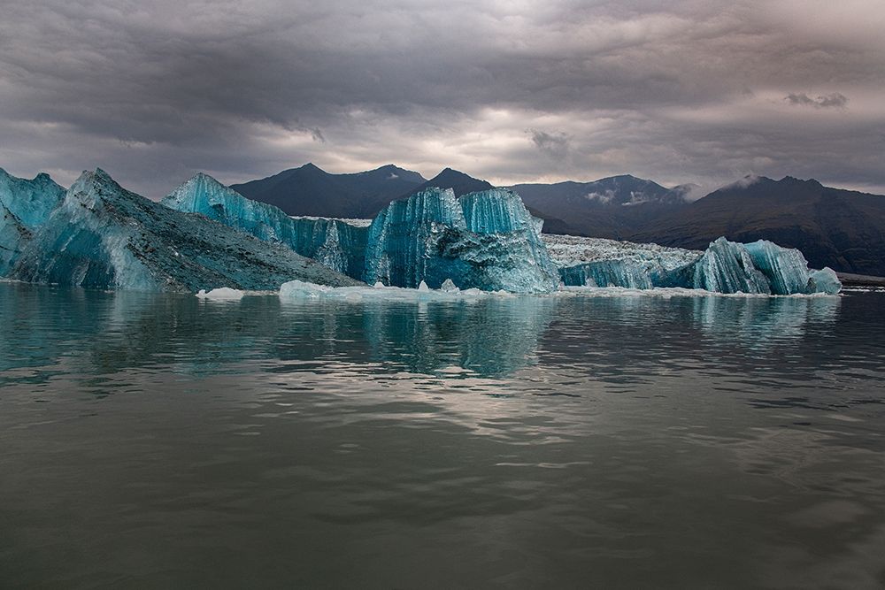 Icebergs from the Jokulsarlon glacier adrift in Jokulsarlon lagoon in Iceland art print by Steve Mohlenkamp for $57.95 CAD