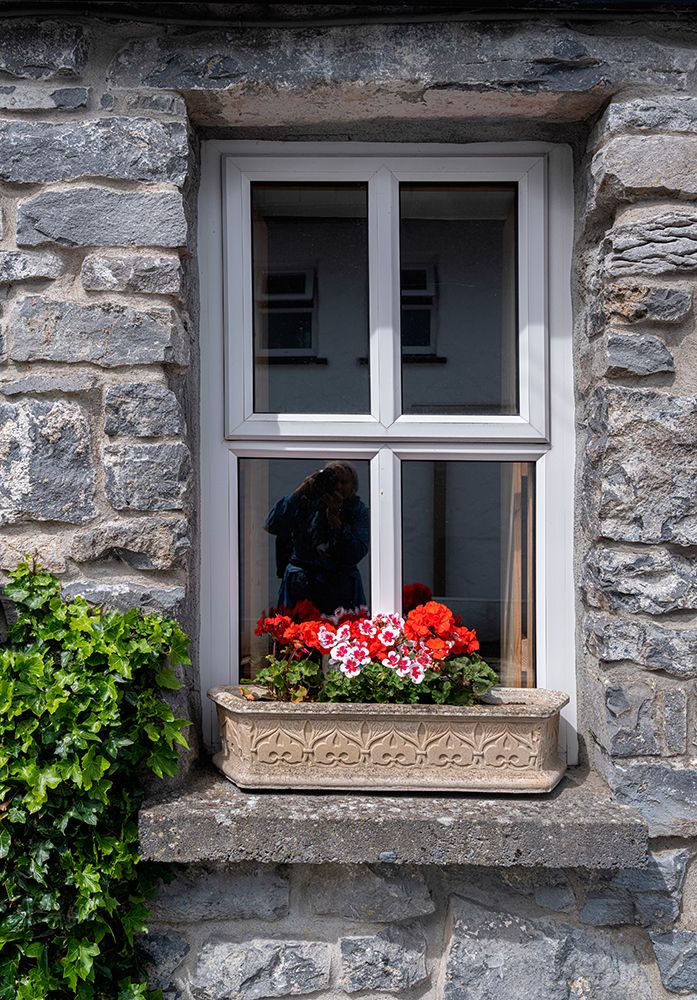 Window brings a smile to passersby in the historic village of Cong-County Mayo-Ireland. art print by Betty Sederquist for $57.95 CAD