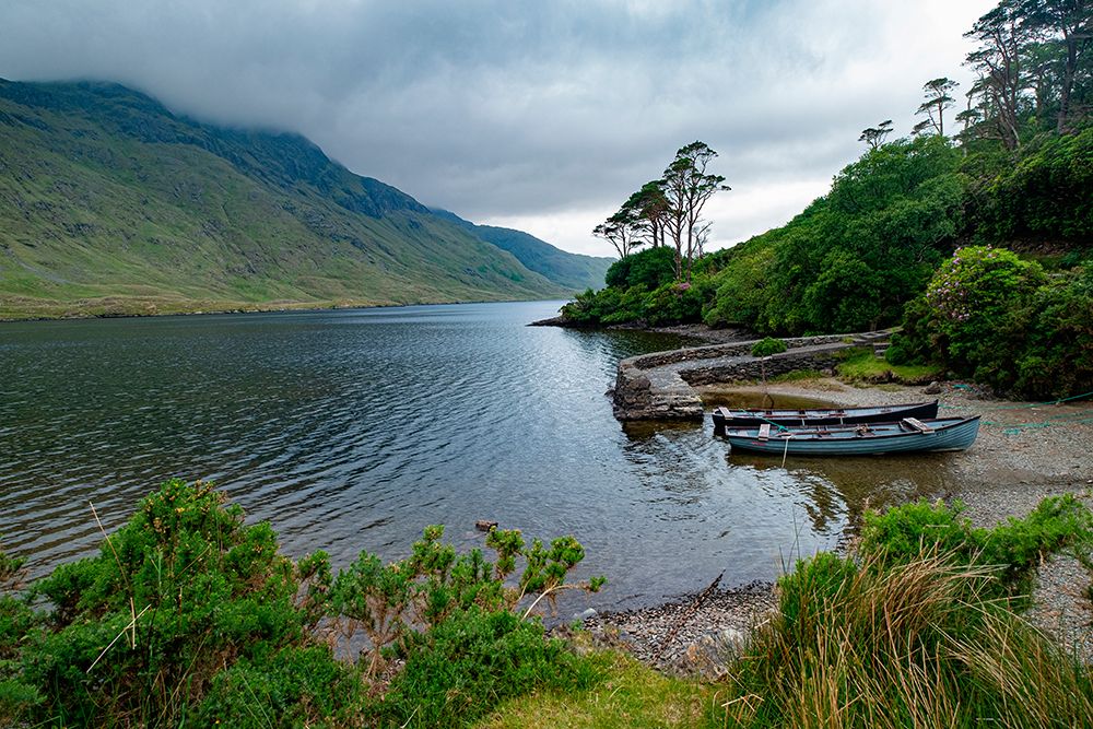 Boats wait for passengers at Doo Lough-part of a national park in County Mayo-Ireland. art print by Betty Sederquist for $57.95 CAD
