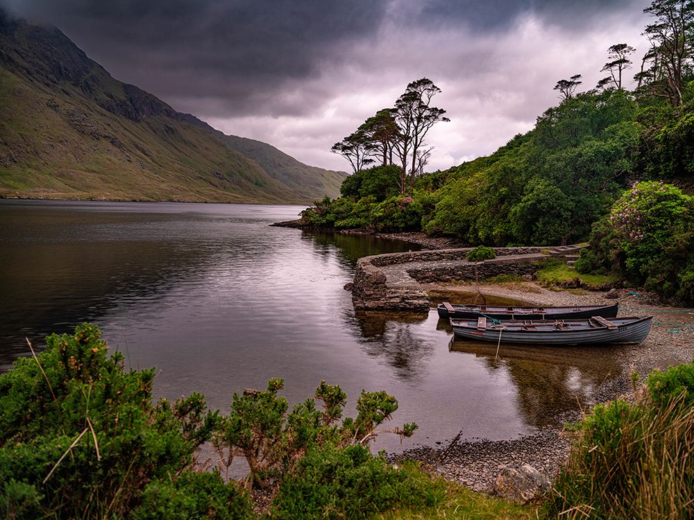 Boats wait for passengers at Doo Lough-part of a national park in County Mayo-Ireland. art print by Betty Sederquist for $57.95 CAD