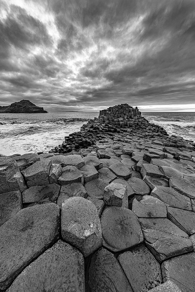 Interlocking basalt columns at sunset at the Giants Causeway near Bushmills-Northern Ireland art print by Chuck Haney for $57.95 CAD
