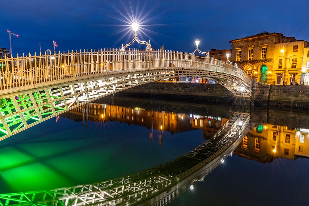 Ha Penny Bridge over the River Liffey at dusk in downtown Dublin-Ireland art print by Chuck Haney for $57.95 CAD