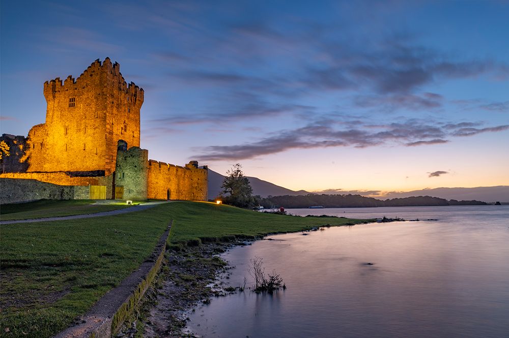 Historic Ross Castle at dusk in Killarney National Park-Ireland art print by Chuck Haney for $57.95 CAD