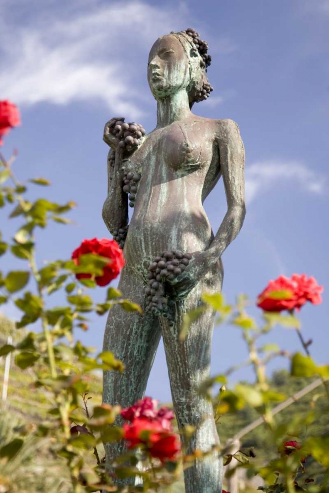 Italy, Manarola Statue of woman holding grapes art print by Wendy Kaveney for $57.95 CAD