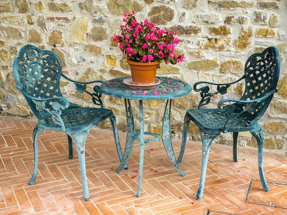 Italy-Chianti Table and chairs with a flowering begonia art print by Julie Eggers for $57.95 CAD