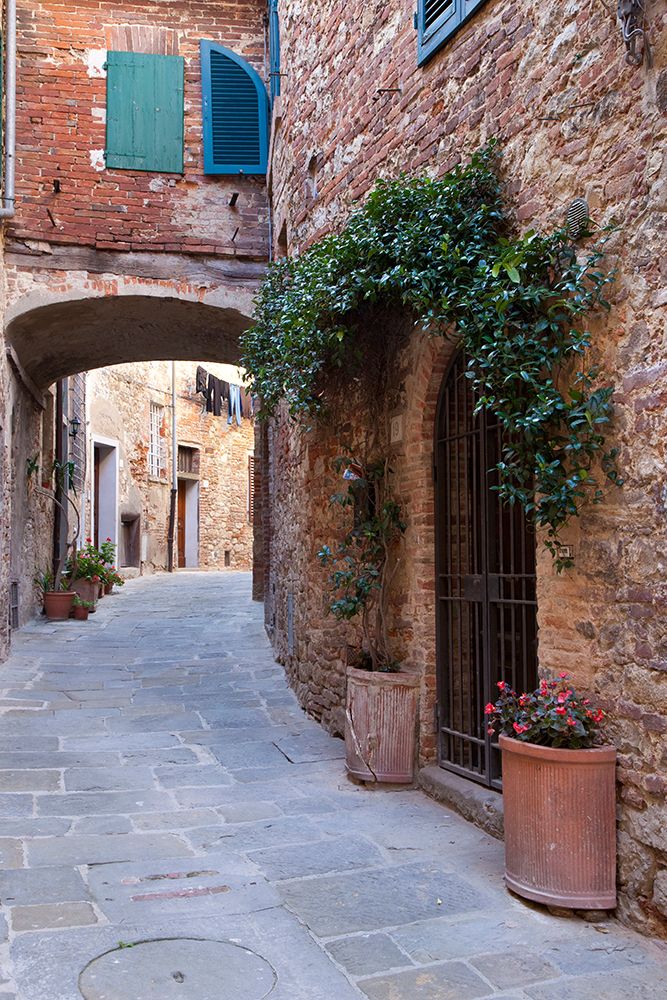Italy-Tuscany Street scene in the medieval village of Lucignano art print by Julie Eggers for $57.95 CAD