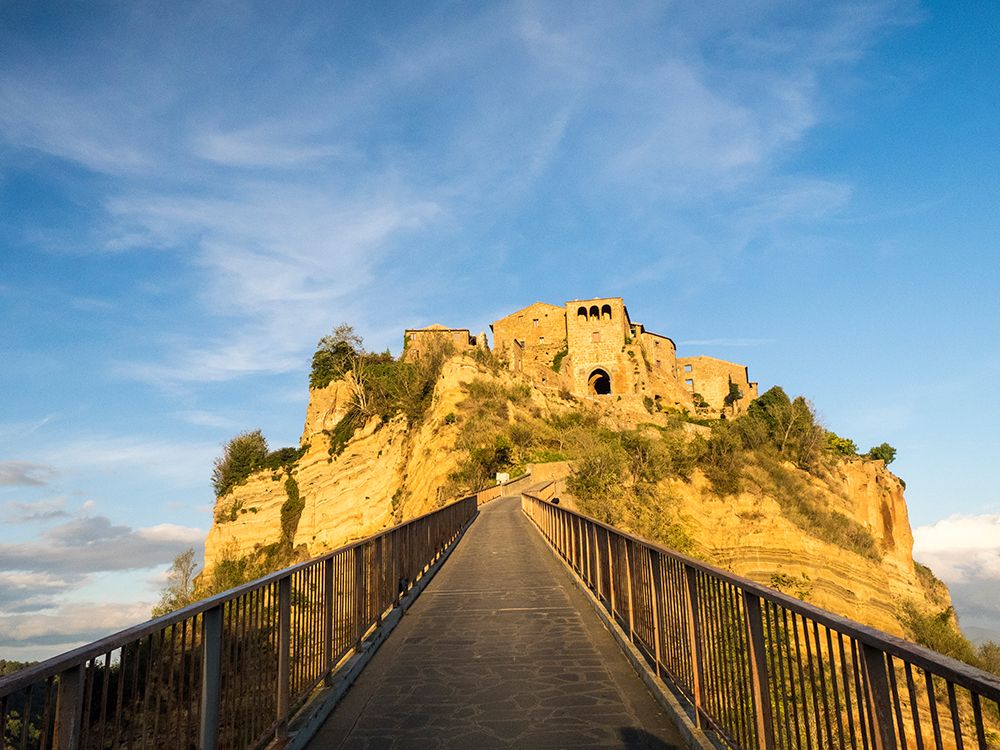 Italy-Tuscany-Civita di Bagnoregio Evening view of the bridge art print by Julie Eggers for $57.95 CAD