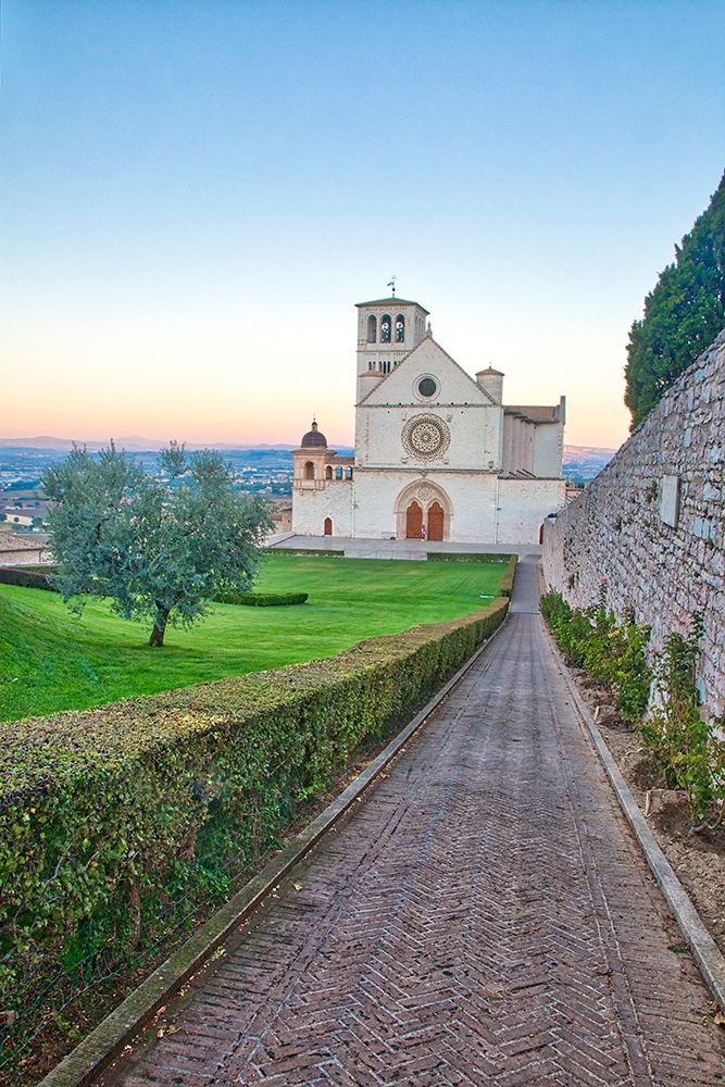 Italy- Umbria- Assisi. Walkway leading to the Basilica of San Francesco. art print by Julie Eggers for $57.95 CAD