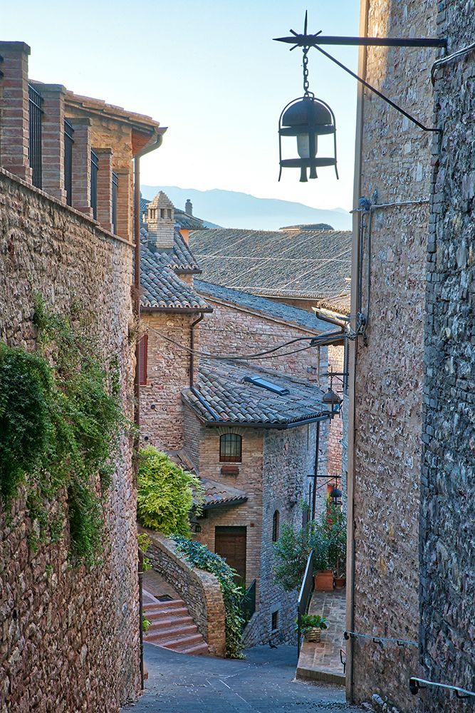Italy- Umbria. Homes along the streets of Assisi. art print by Julie Eggers for $57.95 CAD