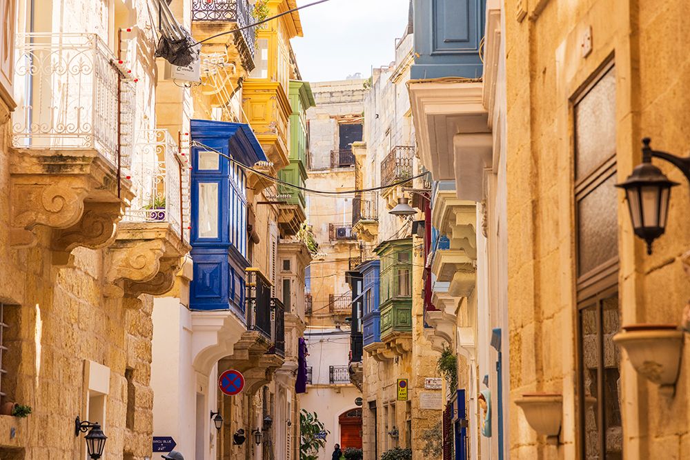 Malta, Birgu. Narrow street with many bay windows. art print by Emily M. Wilson for $57.95 CAD