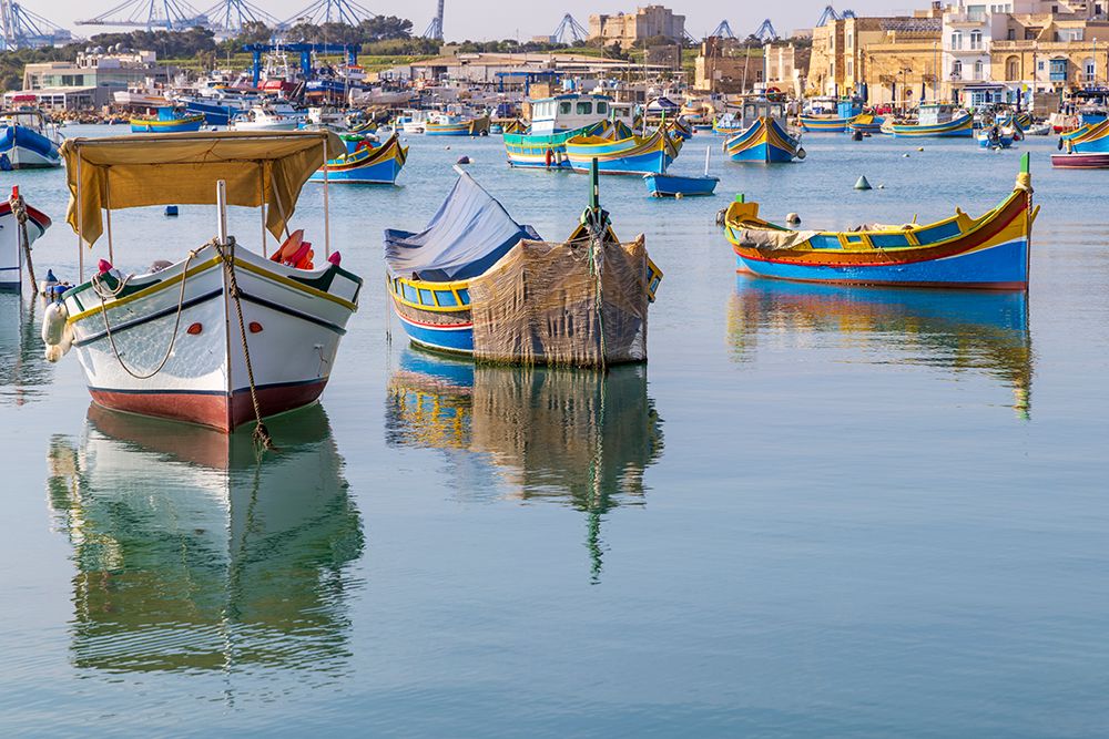 Malta, Marsaxlokk. Marsaxlokk harbor. Luzzijiet, colorful traditional Maltese fishing boats. art print by Emily M. Wilson for $57.95 CAD