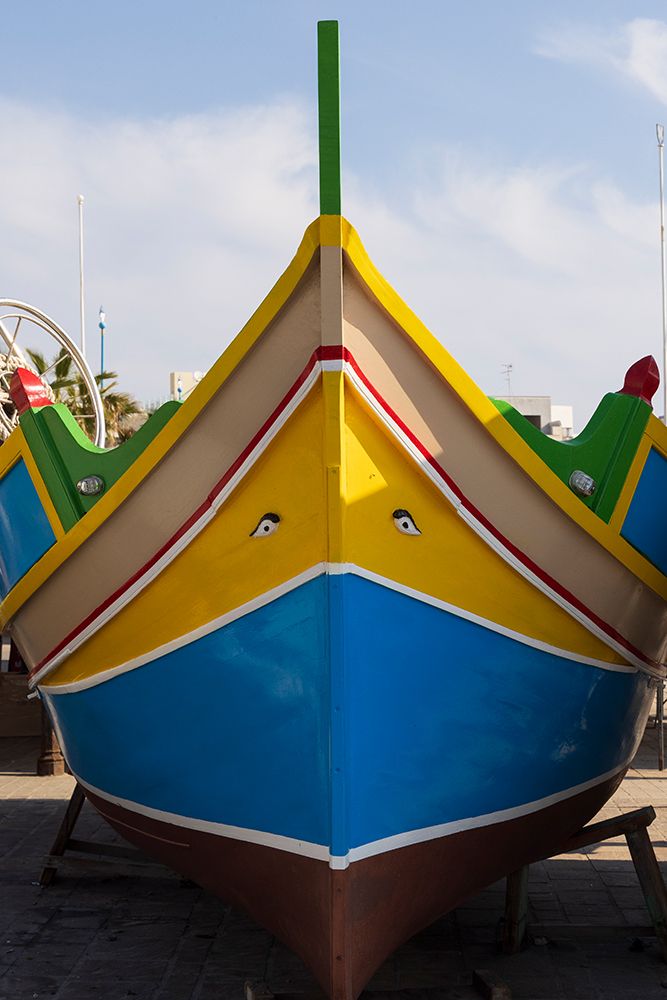 Malta, Marsaxlokk. Marsaxlokk harbor. Luzzijiet, colorful traditional Maltese fishing boats. art print by Emily M. Wilson for $57.95 CAD