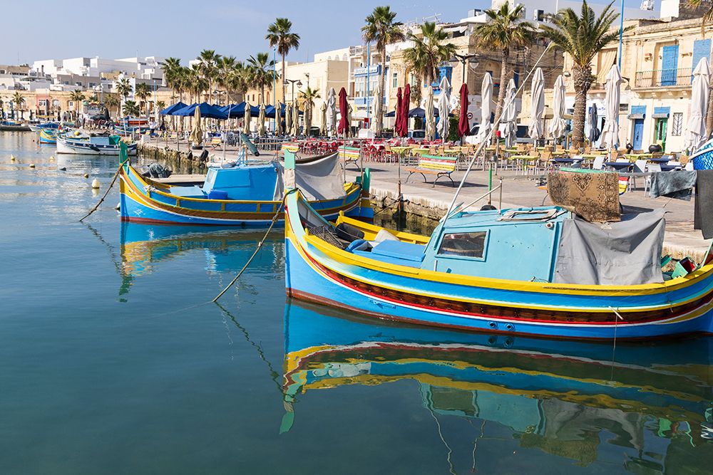 Malta, Marsaxlokk. Marsaxlokk harbor. Luzzijiet, colorful traditional Maltese fishing boats. art print by Emily M. Wilson for $57.95 CAD