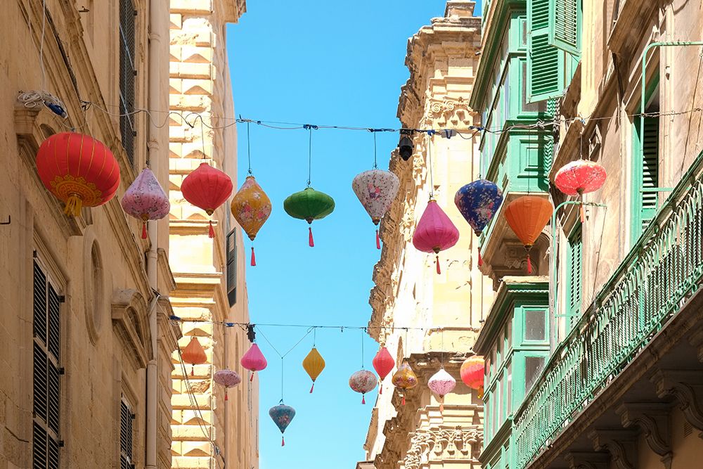 Valetta, Malta. Typical architecture. Chinese lanterns hang from above, art print by Julien McRoberts for $57.95 CAD