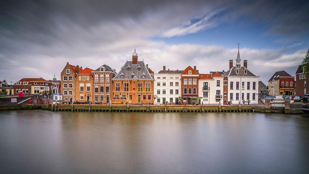 Europe-The Netherlands-Maassluis-Row of buildings on ocean pier art print by Jaynes Gallery for $57.95 CAD