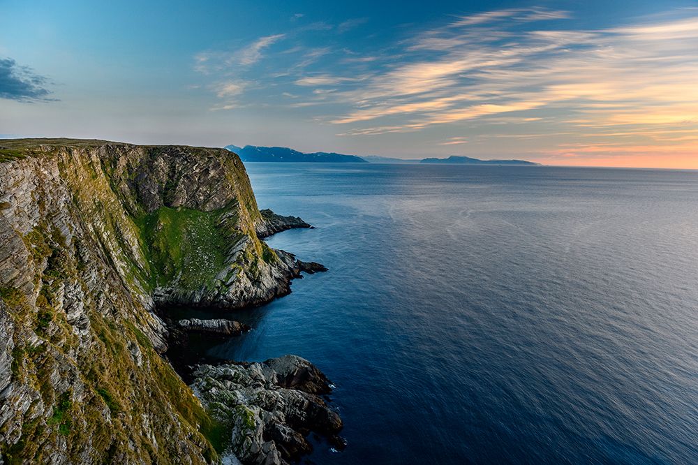 Norway-Finnmark-Loppa. Bird nesting cliffs overlooking the Norwegian Sea. art print by Fredrik Norrsell for $57.95 CAD