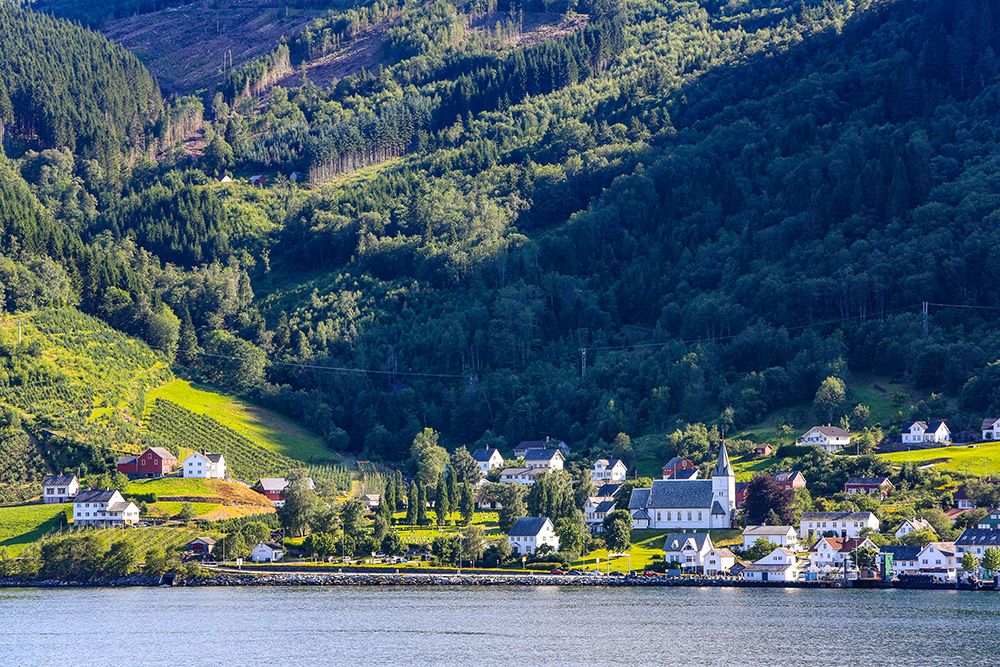 Norway. Norwegian Fjords, scenic villages with a church, red barns and white houses. art print by Jolly Sienda for $57.95 CAD