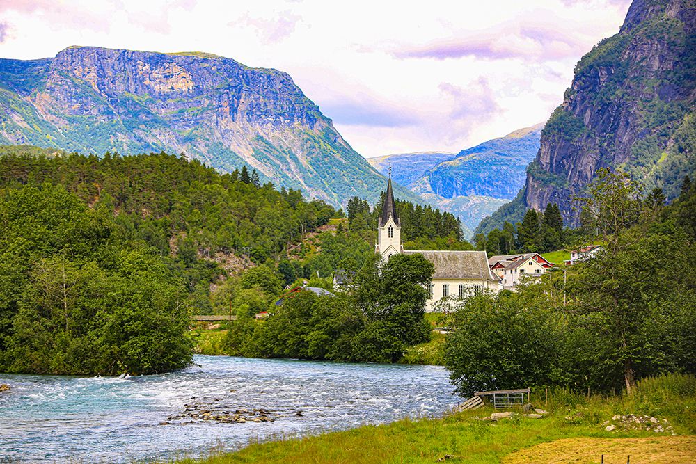 Skjolden, Norway. Sognefjord, white steeple church in village. art print by Jolly Sienda for $57.95 CAD