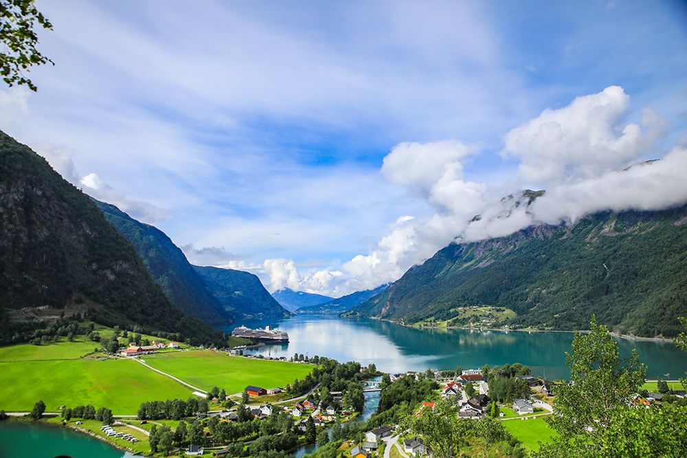 Skjolden, Norway. Aerial view, Fjord, cruise ship, Norwegian village and red barns. art print by Jolly Sienda for $57.95 CAD