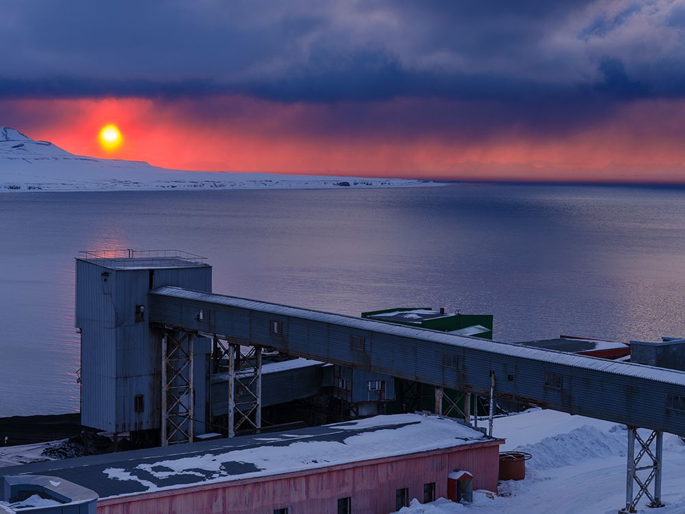 Sunset over the mine Russian coal mining town Barentsburg at fjord GronfjordenNorway art print by Martin Zwick for $57.95 CAD