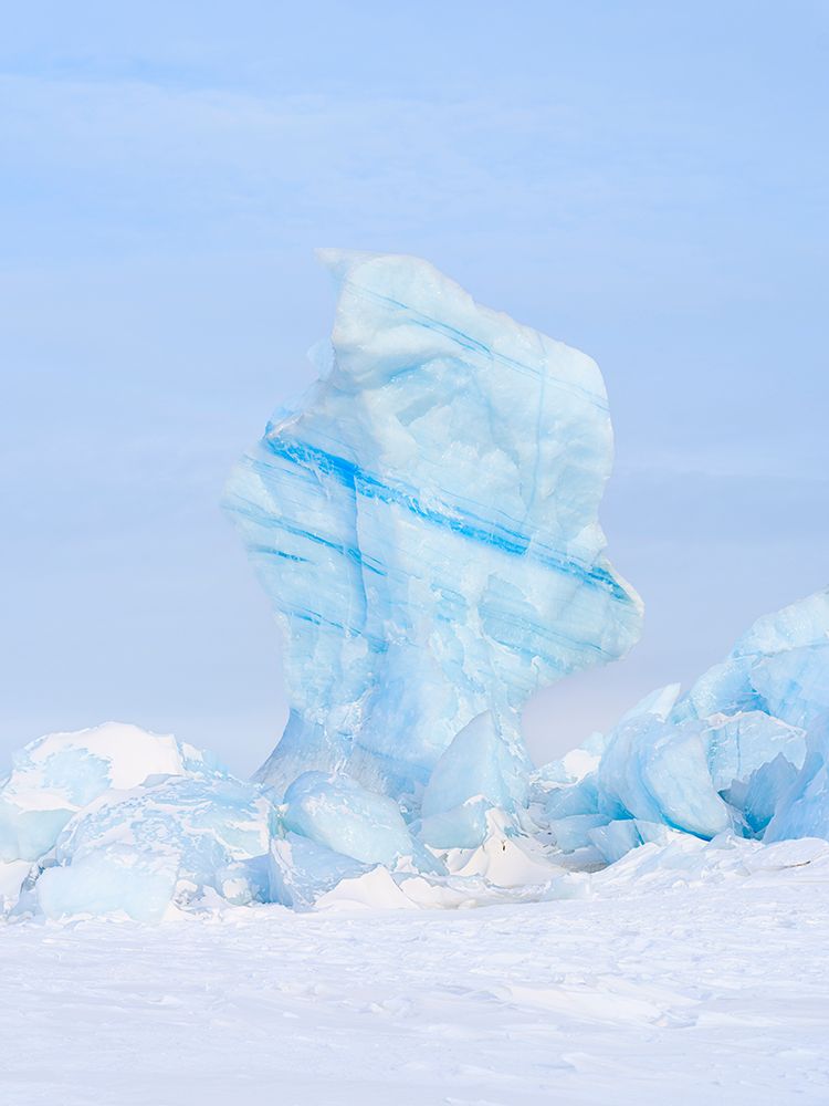 Iceberg in the frozen Mohnbukta in Sabine-Land. Spitzbergen in the Svalbard. Scandinavia, Norway. art print by Martin Zwick for $57.95 CAD