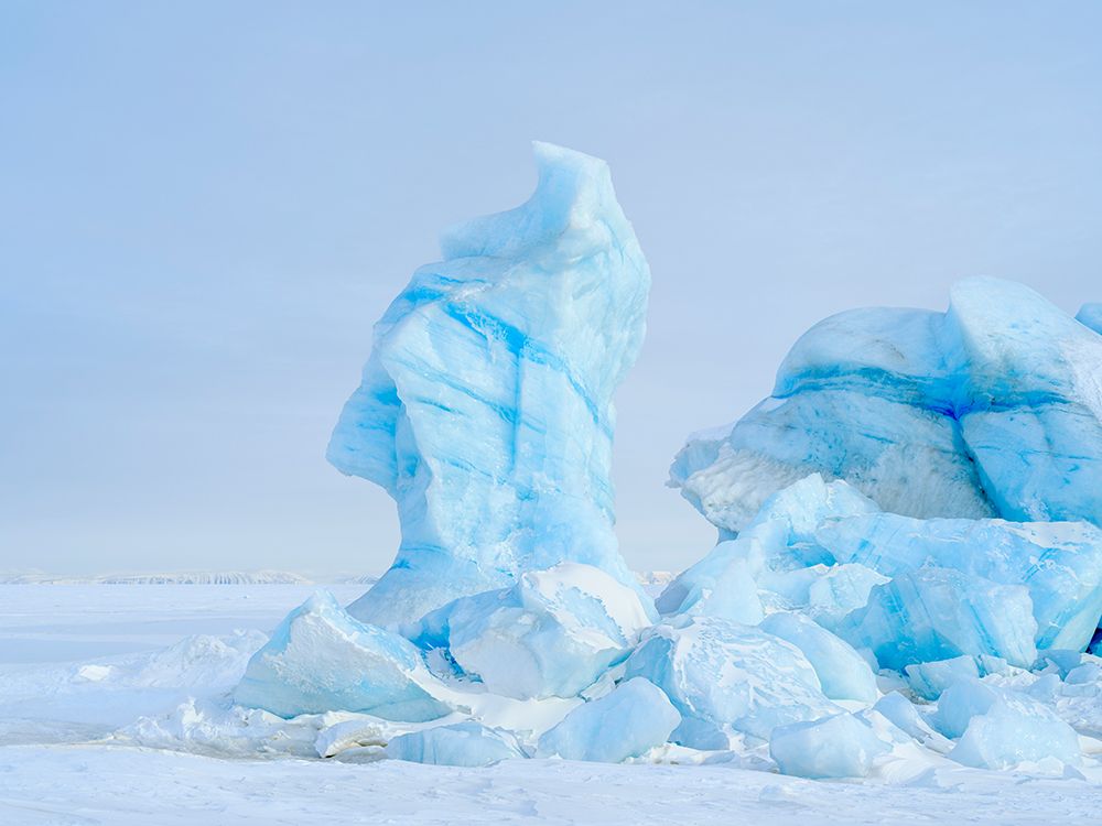 Iceberg in the frozen Mohnbukta in Sabine-Land. Spitzbergen in the Svalbard. Scandinavia, Norway. art print by Martin Zwick for $57.95 CAD