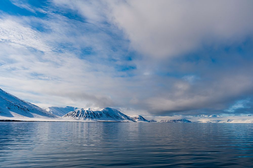 Snow covered mountains rise near the shore of Mushamna Bay Spitsbergen Island-Svalbard-Norway art print by Sergio Pitamitz for $57.95 CAD