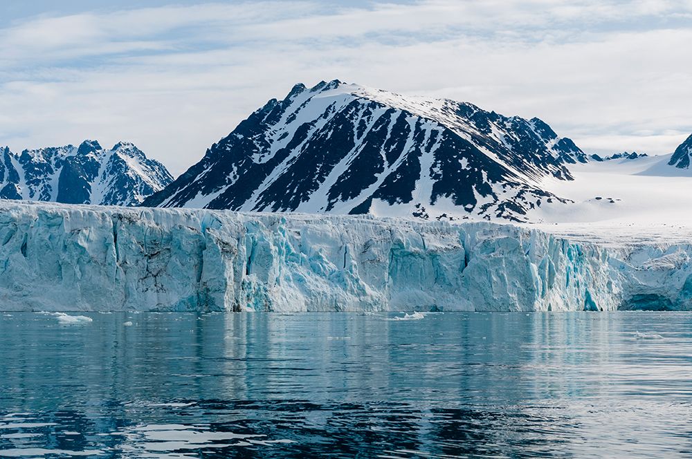 Arctic waters front Lilliehook Glacier and snowy mountains beyondSpitsbergen Island-Norway art print by Sergio Pitamitz for $57.95 CAD