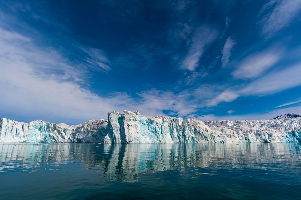 Lilliehook Glacier and reflection on arctic waters Lilliehookfjorden-Spitsbergen Island-Norway art print by Sergio Pitamitz for $57.95 CAD