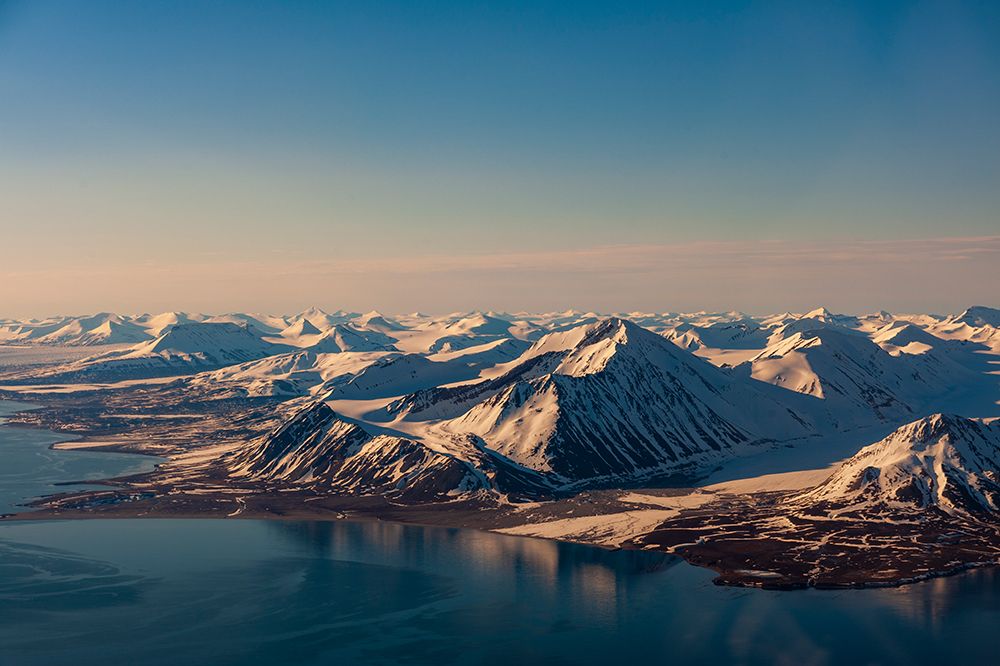 Sunlight highlights ice covered mountains on Spitsbergen Island-Norway art print by Sergio Pitamitz for $57.95 CAD