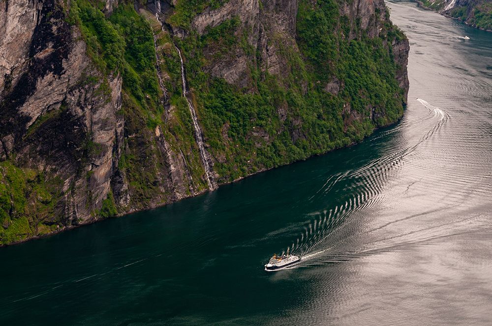 A cruise ship navigates past sheer cliffs in Geirangerfjord-Norway art print by Sergio Pitamitz for $57.95 CAD