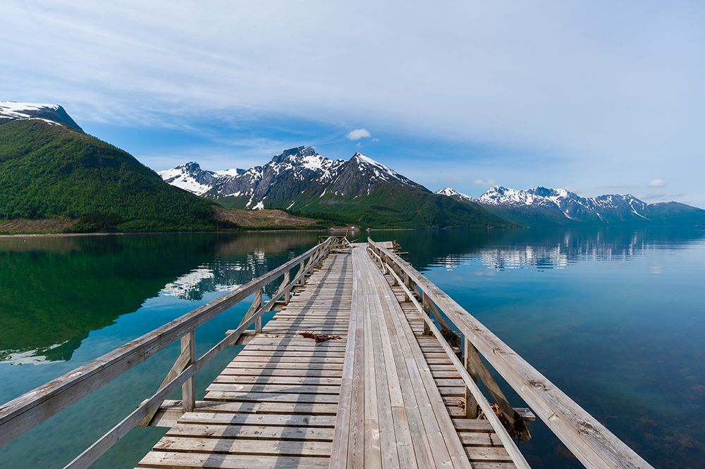 A pier on Holandsfjorden-rimmed with ice streaked mountains-near Svartisen Svartisen-Norway art print by Sergio Pitamitz for $57.95 CAD