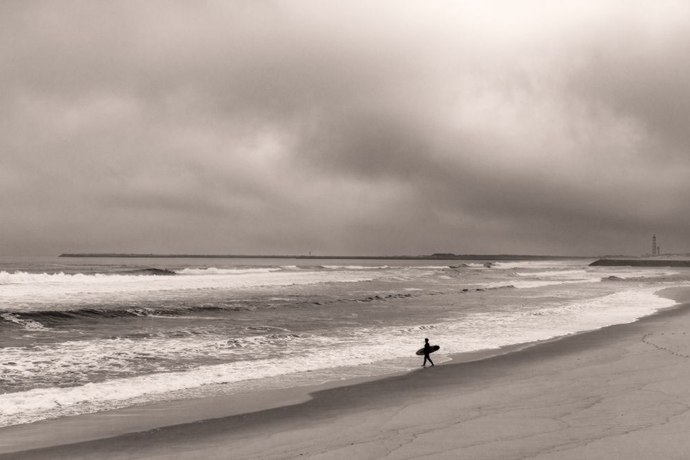Surfing at Costa Nova, Portugal art print by Chuck Haney for $57.95 CAD