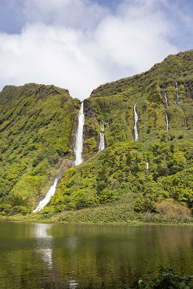 Azores, Portugal. Waterfall dropping into Lagoa dos Patos on Flores Island. art print by Emily M. Wilson for $57.95 CAD